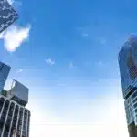 A photo of some buildings and the sky, shot from the ground.